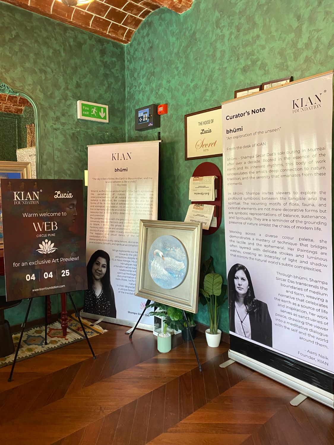 Welcome board and standees in the green room