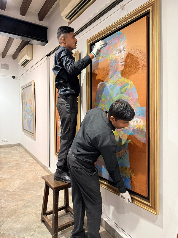 Team installing Bhūmi artwork
