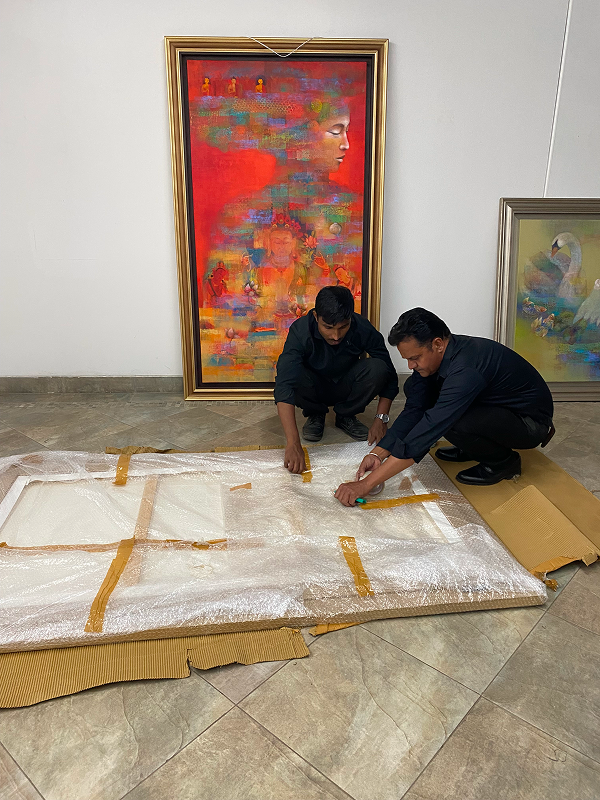 Team wrapping Bhūmi artwork