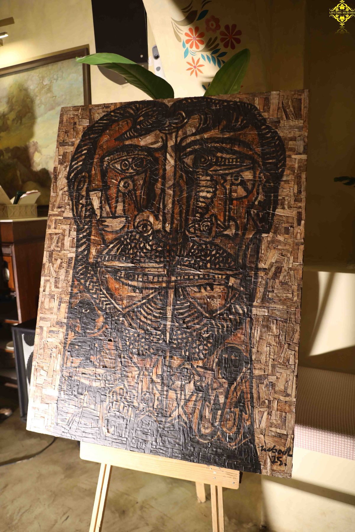 Twin face in bark collage