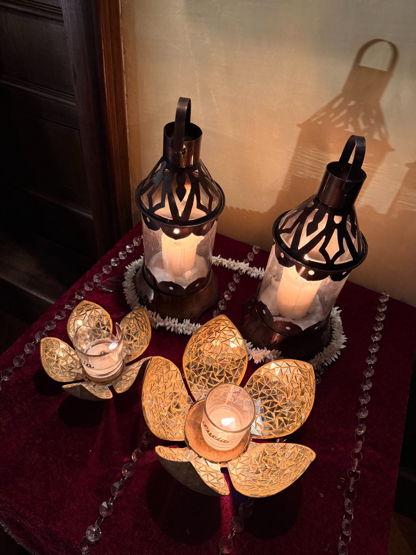 Lanterns and mirrored lotus candle holders