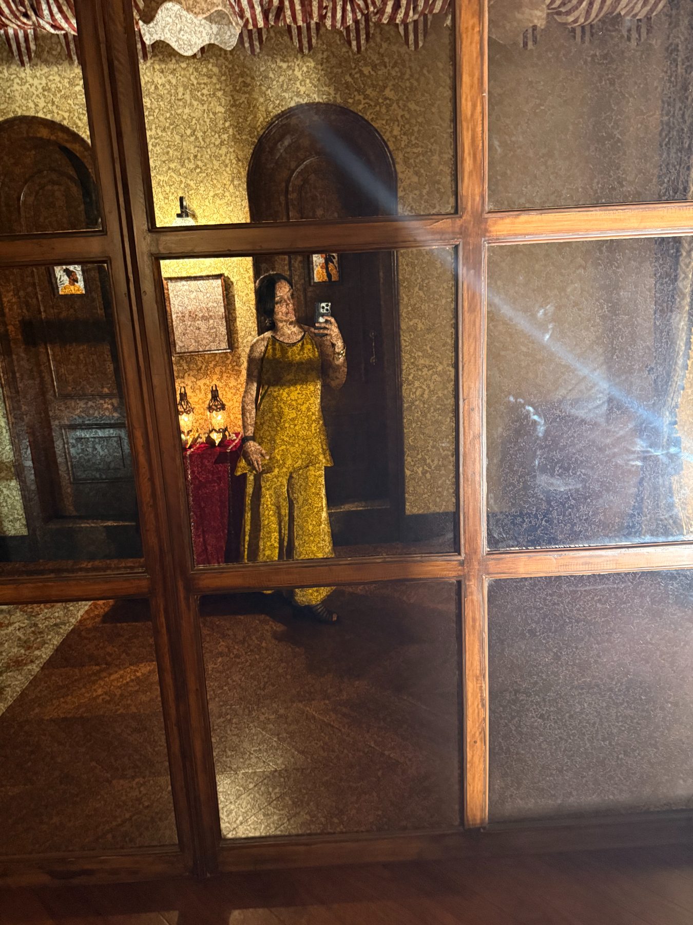 A reflection in the antique mirror
